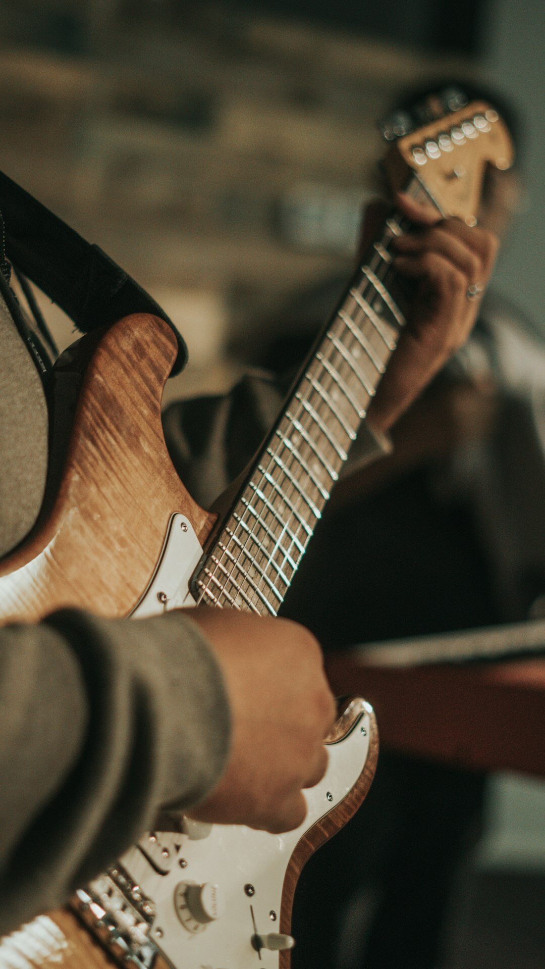 musician playing guitar