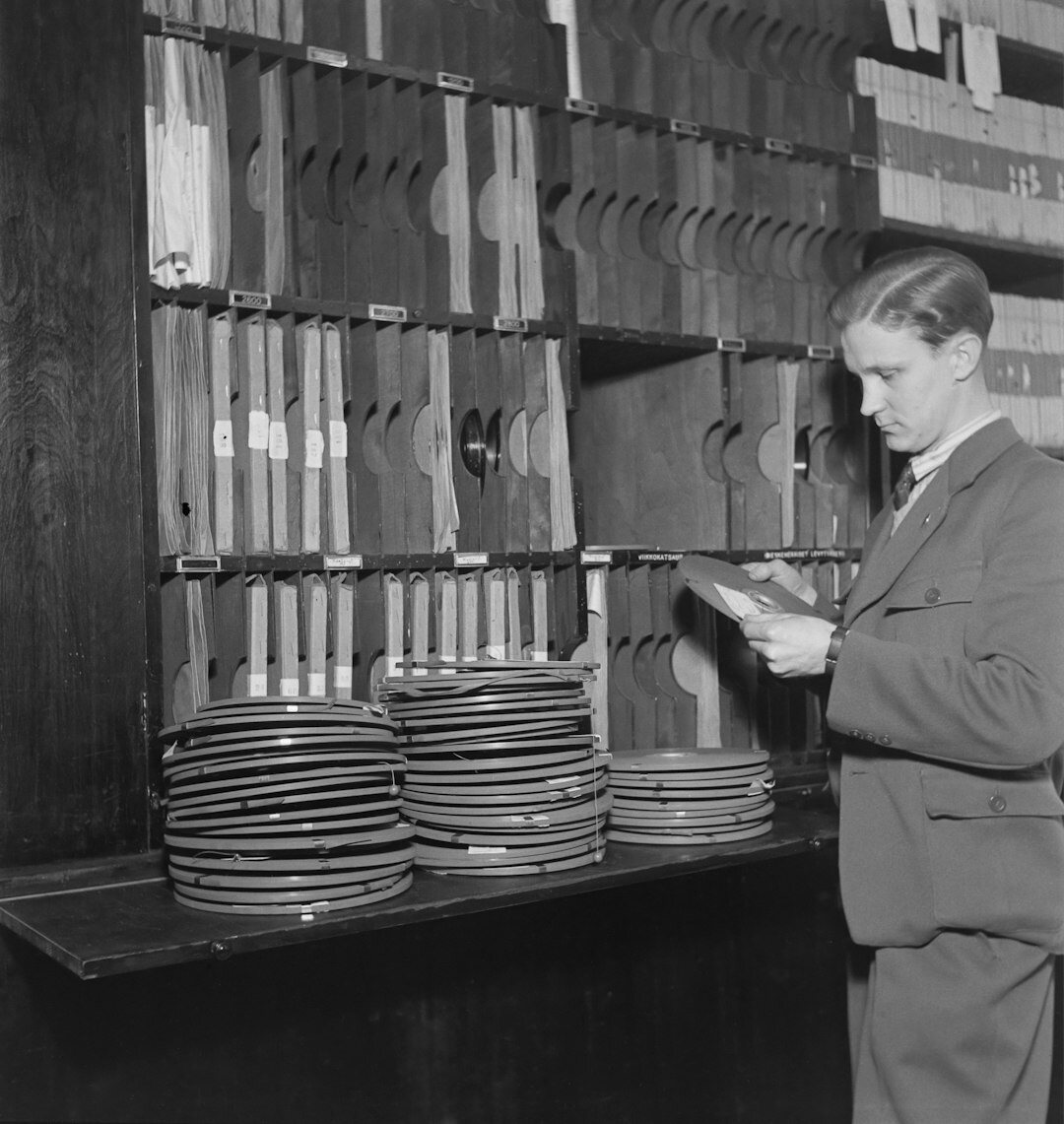 archivist examining old documents